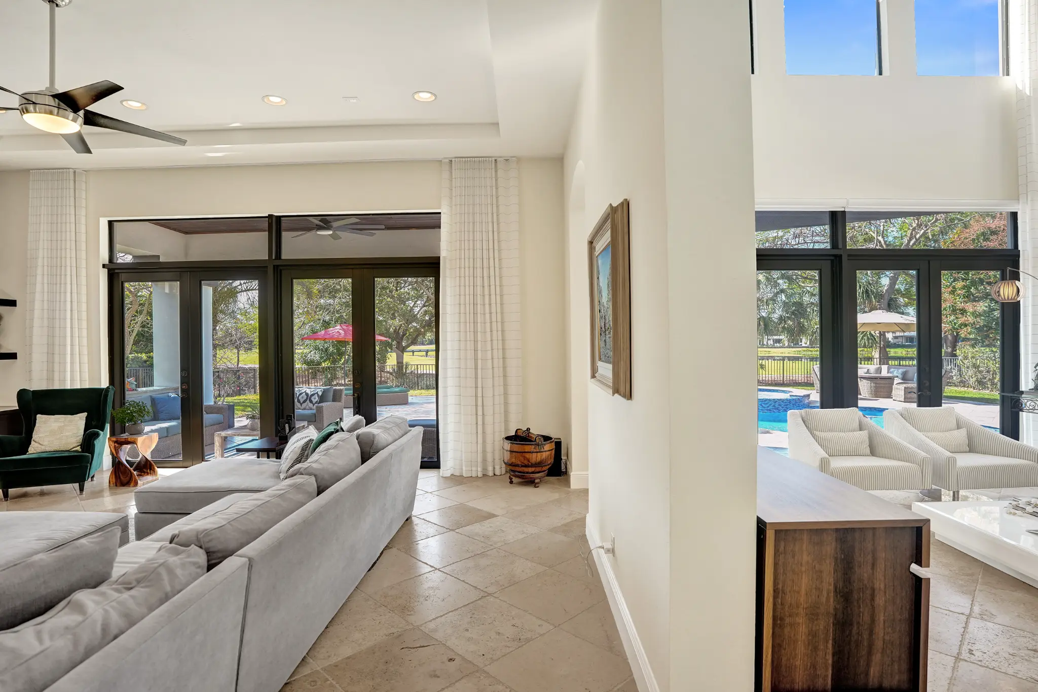 Remodeled kitchen with waterfall quartz island