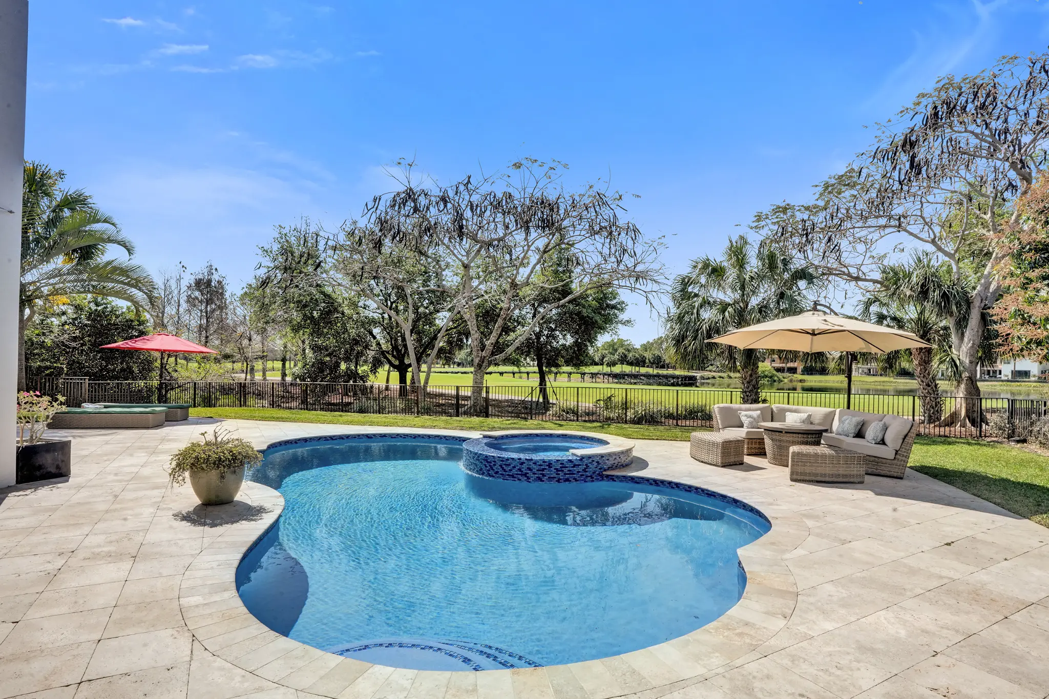 Heated saltwater pool with golf course views
